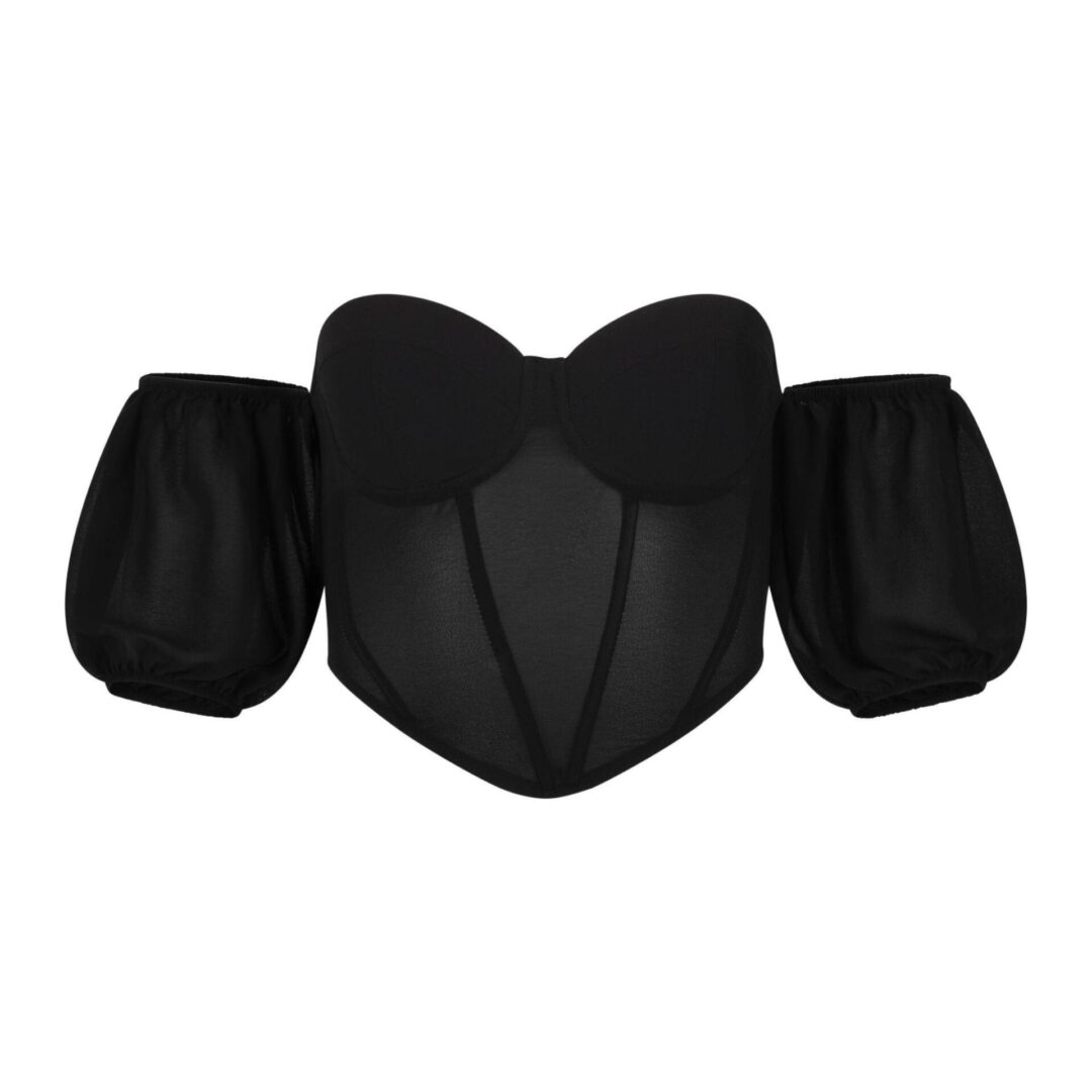 A black bra with puff sleeves on top of it.