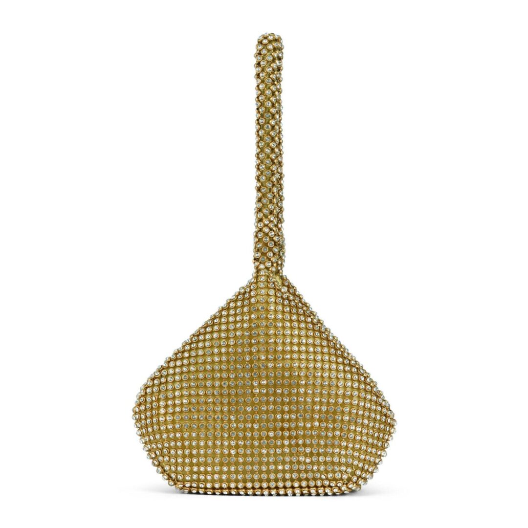 A gold bag with a handle on the side.